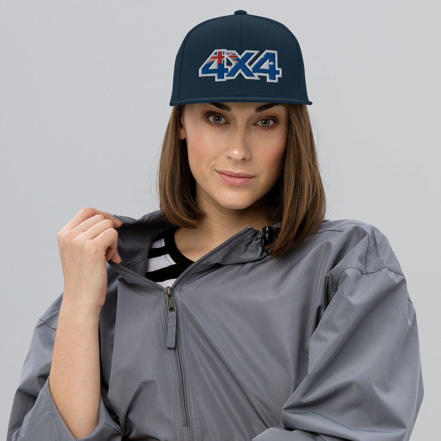 Woman wearing navy blue 4x4 trails cap