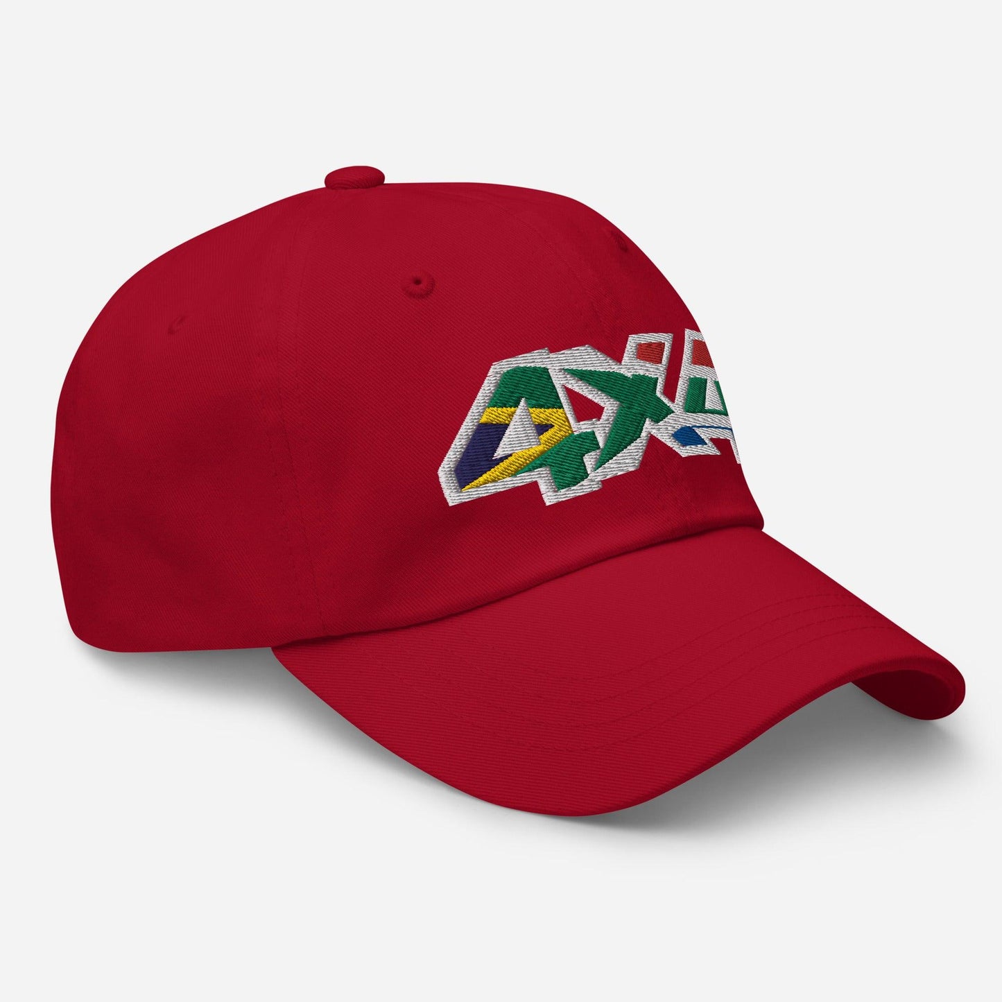 Side view of a red ball cap/hat with embroidery