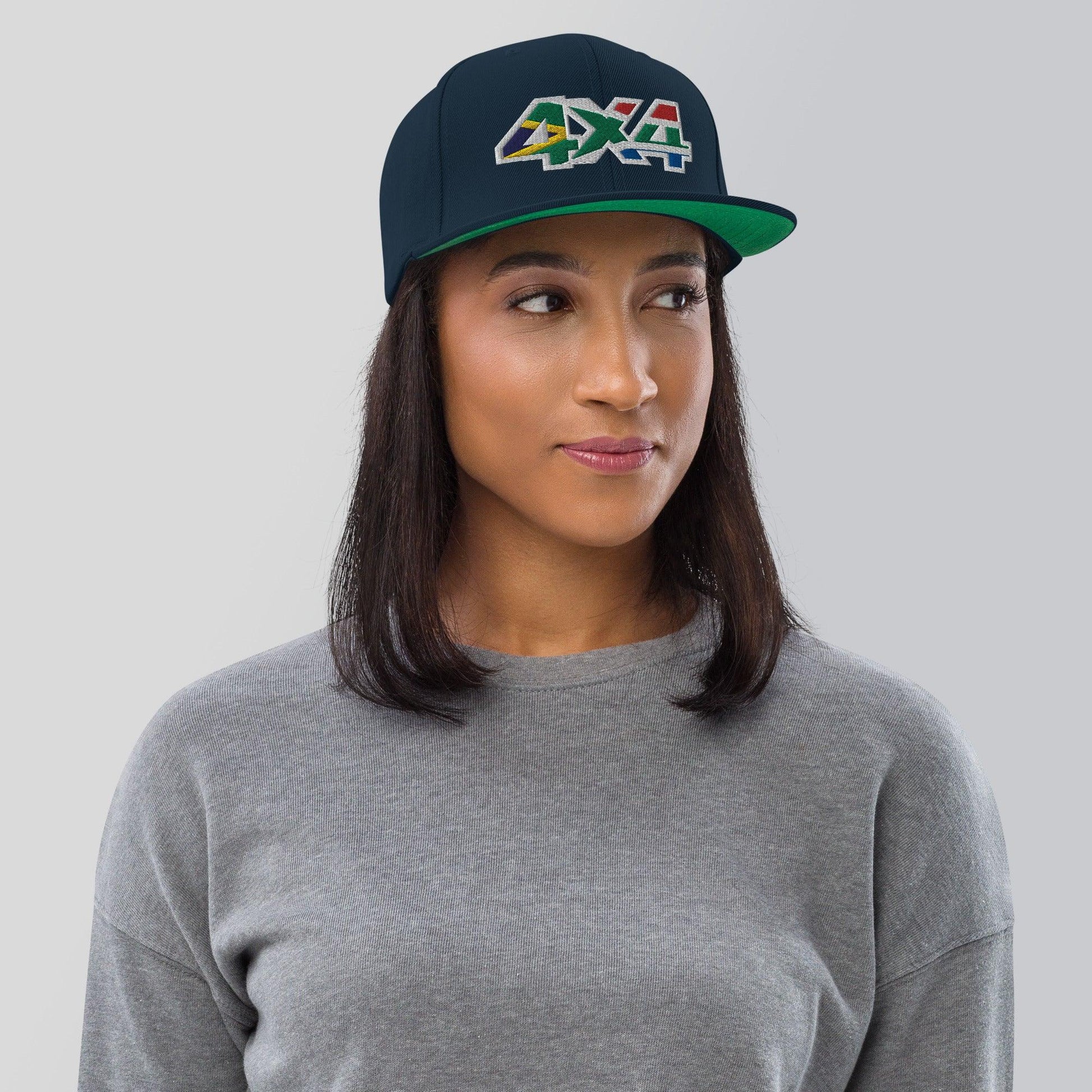 Woman wearing a navy blue 4x4 South Africa snapback hat