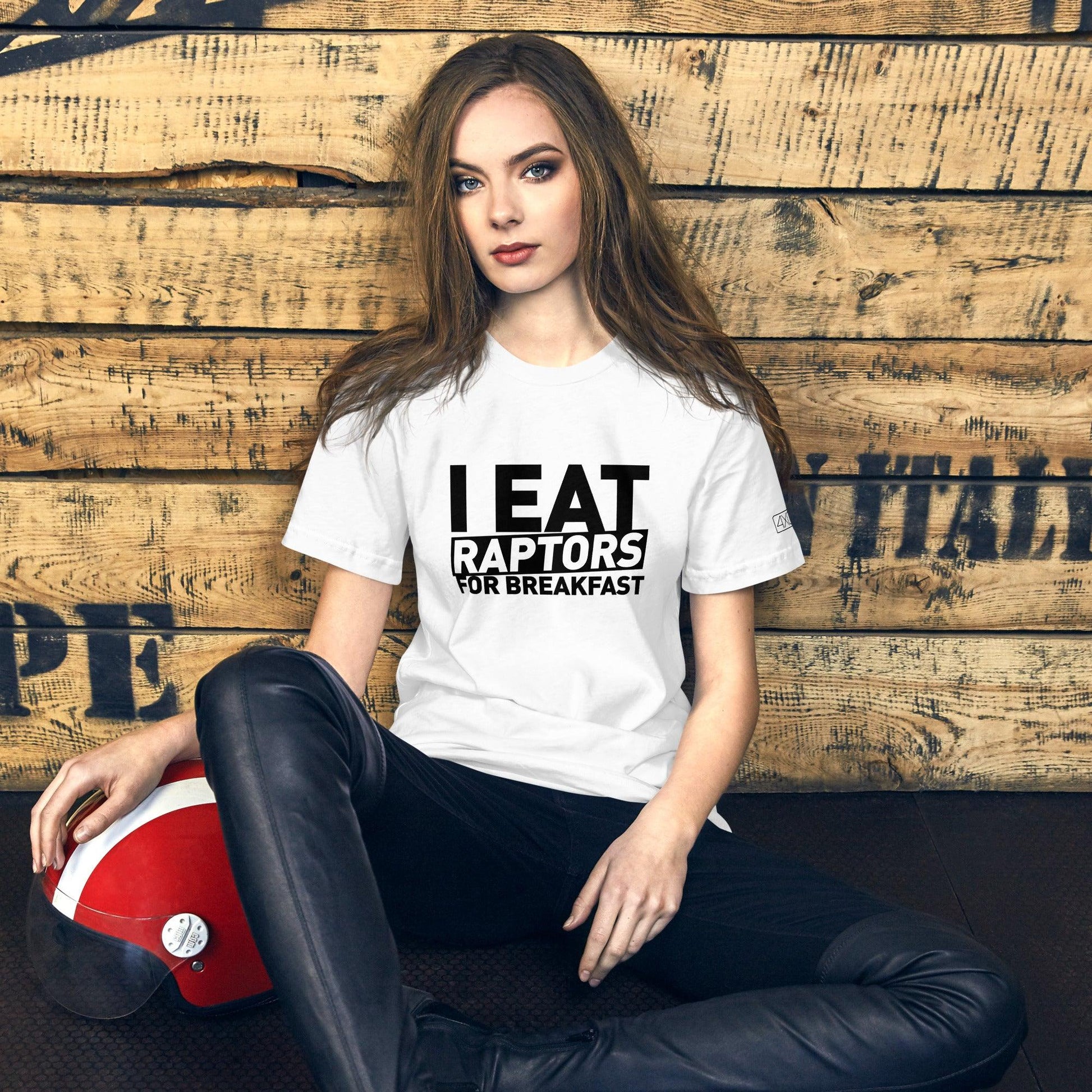 Woman sitting with a white t-shirt with  a "I Eat Raptors for Breakfast" print